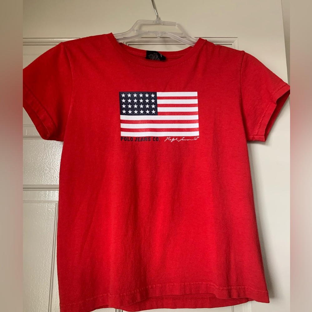 Red T-shirt with American flag on the front. From Polo Jeans Co. Ralph Lauren.